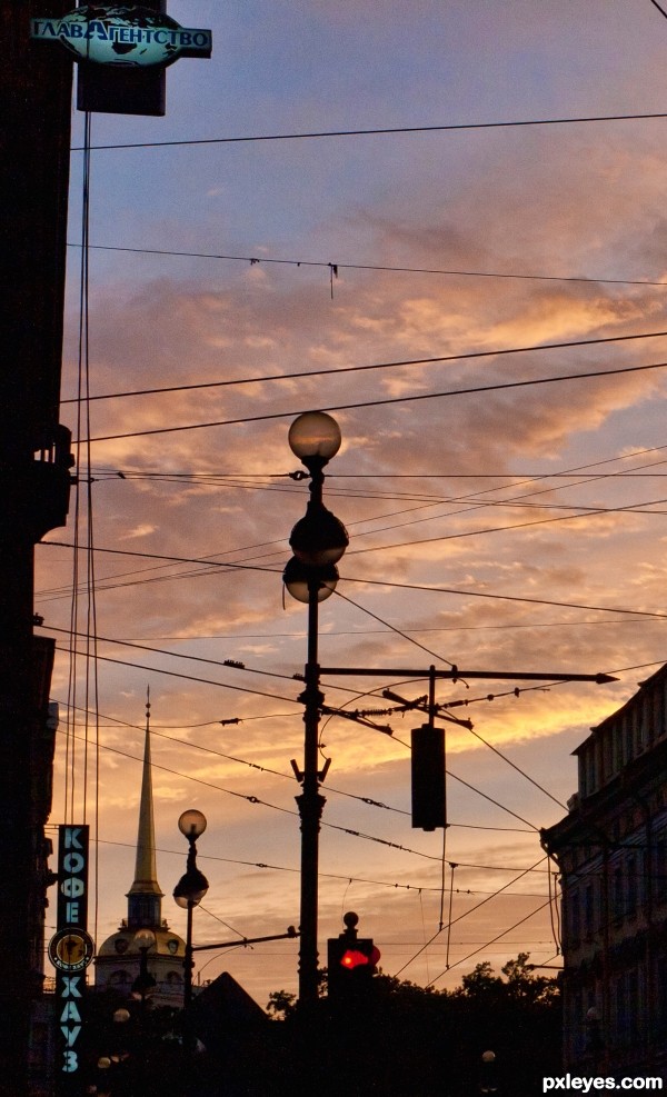 Power poles at sunset